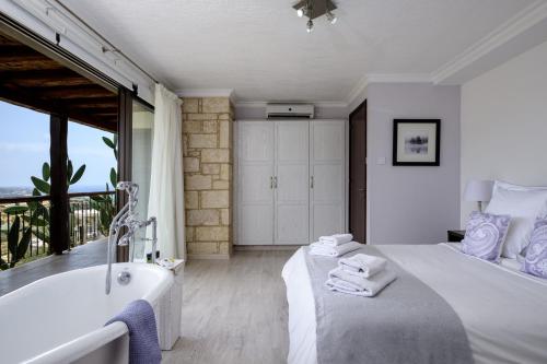 Llit o llits en una habitació de Villa Thea