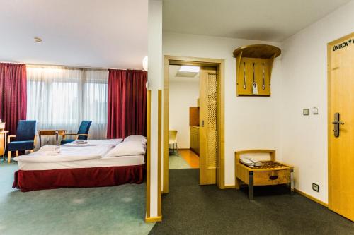 מיטה או מיטות בחדר ב-Hotel SET