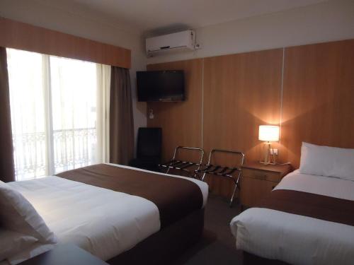 Katil atau katil-katil dalam bilik di Albury Regent Motel