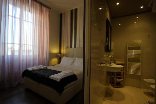 Et badeværelse på Luxury B&B La Dimora Degli Angeli