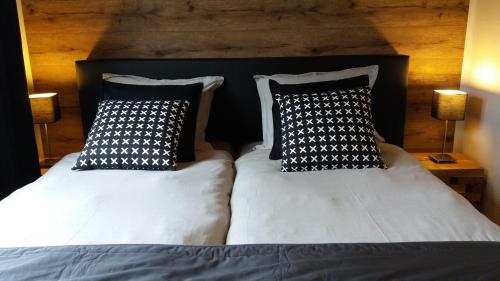 Postel nebo postele na pokoji v ubytování Le Chalet de Marguerite