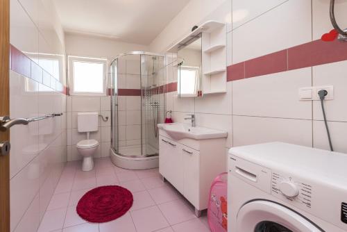Kúpeľňa v ubytovaní Apartman Micko