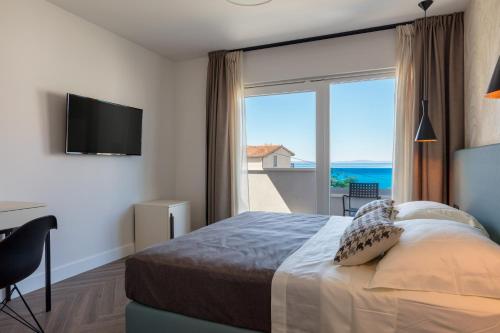 Posteľ alebo postele v izbe v ubytovaní Luxury Villa Karla