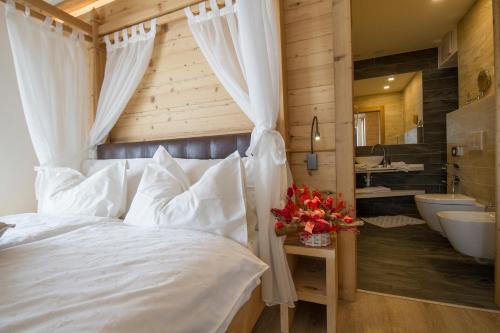 מיטה או מיטות בחדר ב-La Torretta
