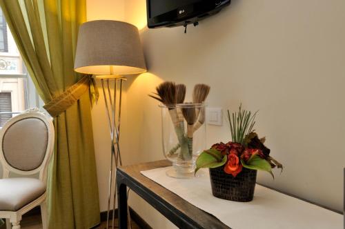 Et tv og/eller underholdning på Luxury B&B La Dimora Degli Angeli