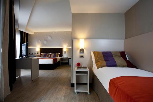 Two Hotel Buenos Aires tesisinde bir odada yatak veya yataklar