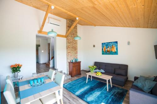 Posezení v ubytování Duna Apartman