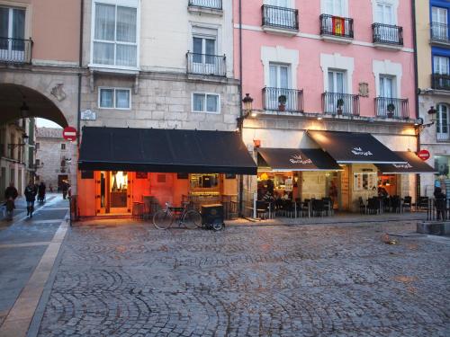 a cobblestone street in front of a building at Minaya in Burgos