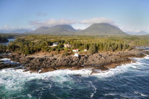 an island in the ocean next to the water at Black Rock Oceanfront Resort in Ucluelet