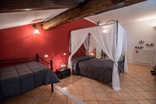 Voodi või voodid majutusasutuse Palazzo della Loggia B&B toas