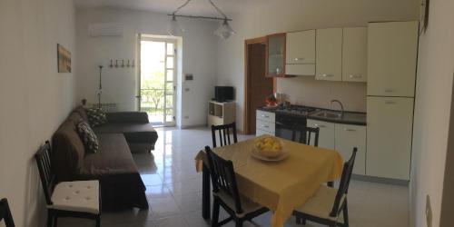 Kuchyňa alebo kuchynka v ubytovaní Casa Vacanze il Gelsomino