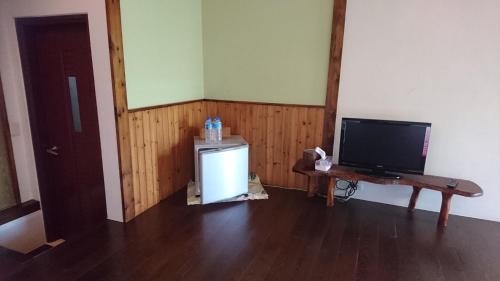 TV a/nebo společenská místnost v ubytování Knt House