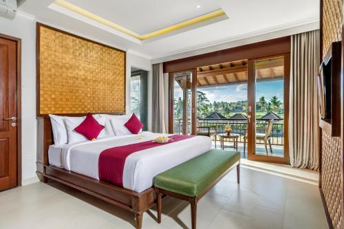 Кровать или кровати в номере Bumi Muwa Ubud Katiklantang