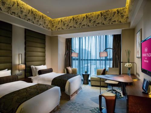 Postel nebo postele na pokoji v ubytování Crowne Plaza Hefei by IHG