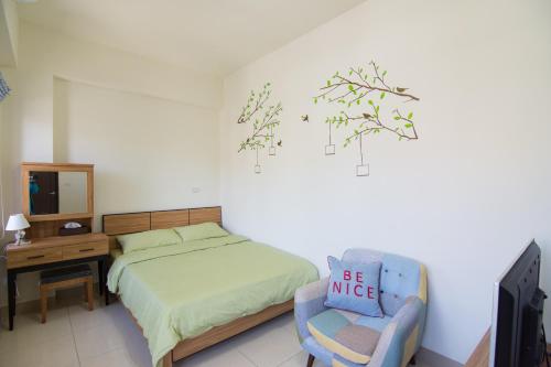 Postel nebo postele na pokoji v ubytování Gold Ya Homestay