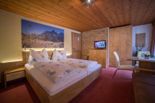 Säng eller sängar i ett rum på Gästehaus Haag