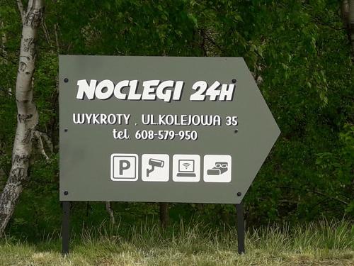 Wykroty的住宿－Gospodarstwo Agroturystyczne " GABRYSIA "，上面写着诺格斯的标志