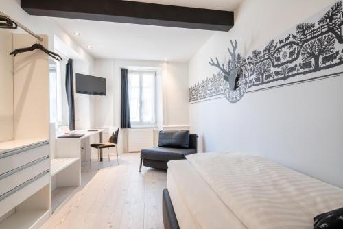 Postel nebo postele na pokoji v ubytování Hotel Murtenhof & Krone