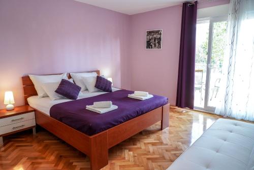 Cama o camas de una habitación en Apartments Dadic