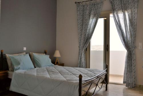 Elounda Sea View 객실 침대