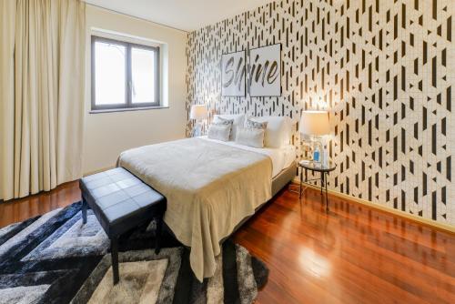 ミラノにあるSweet Inn -Romagnosiのベッドルーム1室(ベッド1台付)