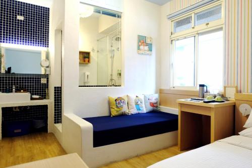 Postel nebo postele na pokoji v ubytování Ming Shui Lu Homestay