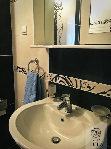 Un baño de Apartments Villa Luka