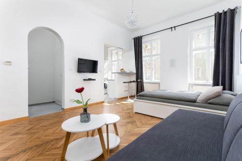 Televízia a/alebo spoločenská miestnosť v ubytovaní Central Vienna-Living