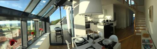 a view of a balcony of a house with a table at Tor zum Meer in Helgoland