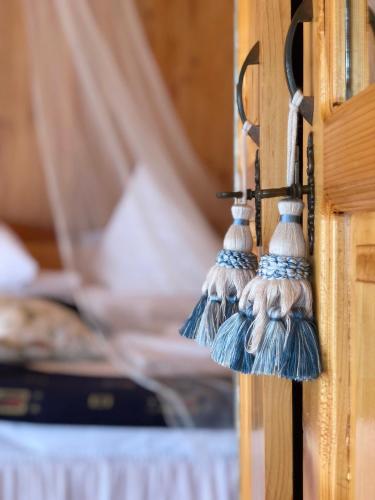 a bunch of tassels hanging from a door at Dream Tricule in Sviniţa