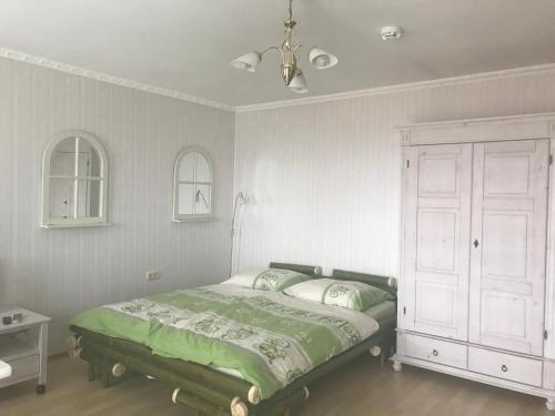 Katil atau katil-katil dalam bilik di Ferienwohnung Meeresblick