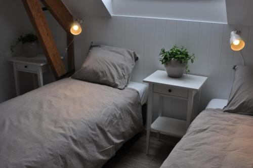 Łóżko lub łóżka w pokoju w obiekcie Casa-Anja