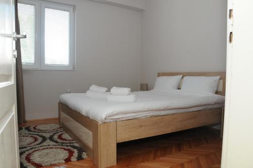 Кровать или кровати в номере Dada Lux