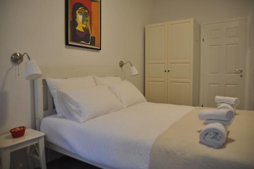 Postel nebo postele na pokoji v ubytování Amalia Apartments