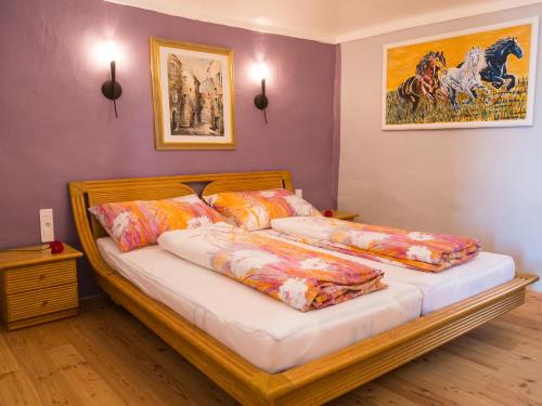 a bed with two pillows on it in a bedroom at Eze Monaco middle of old town of Eze Vieux Village Romantic Hideaway with spectacular sea view in Èze