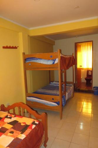 Postel nebo postele na pokoji v ubytování Nery Lodging