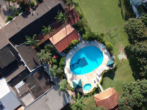 Piscina de la sau aproape de Rio Claro Plaza Hotel