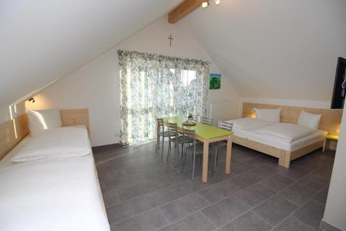 Postel nebo postele na pokoji v ubytování Gita´s Haus