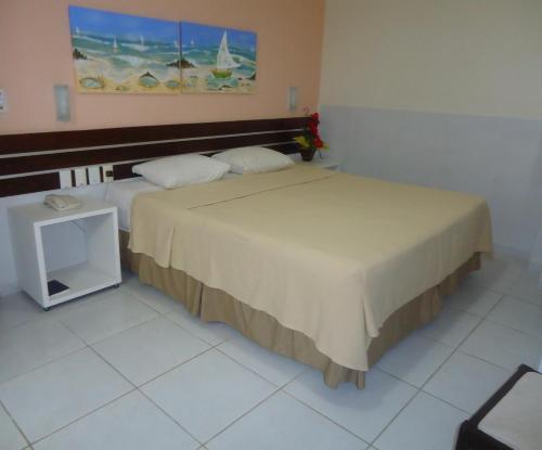 Ένα ή περισσότερα κρεβάτια σε δωμάτιο στο Hotel Pousada Tamandaré - PB