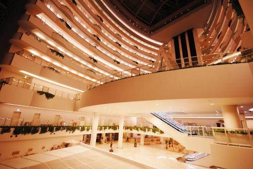 a large shopping mall with a large ceiling at Hotel Kyocera in Kirishima