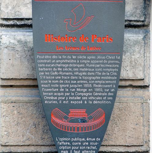 a sign on the side of a building at Hotel Des Arenes in Paris