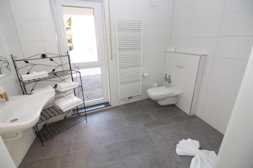 Koupelna v ubytování Gita´s Haus