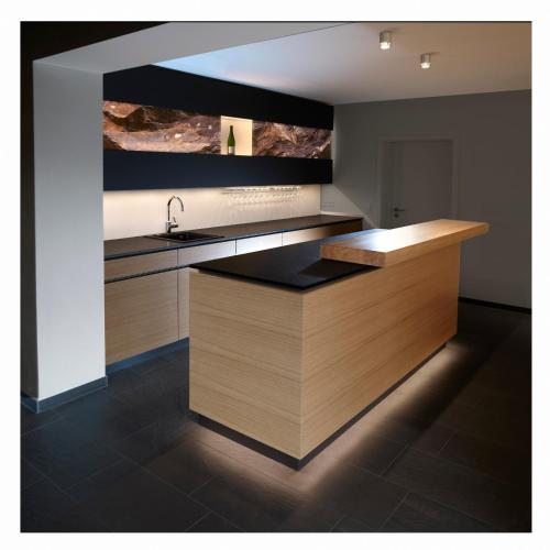 a kitchen with a sink and a counter top at Ernst Clüsserath Weingut & Weinhotelchen in Trittenheim