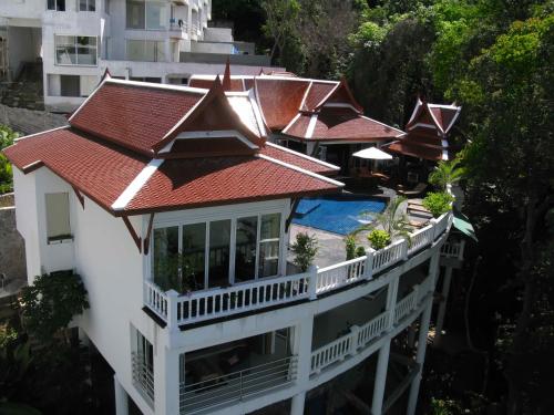 an aerial view of a building with a red roof at Villa REGTUK in Patong Beach