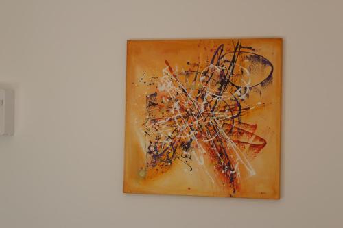 a painting of a flower on a wall at Etablissements Coulon - Talence (Chemin d'Ars) in Talence