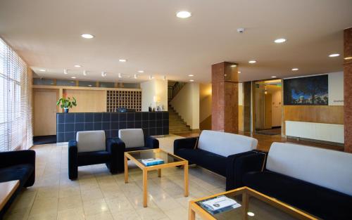 The lobby or reception area at Hotel Laterum