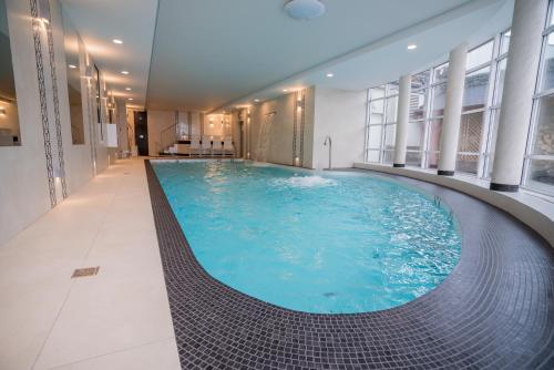 a large swimming pool in a building at Orlicka Skała in Zieleniec