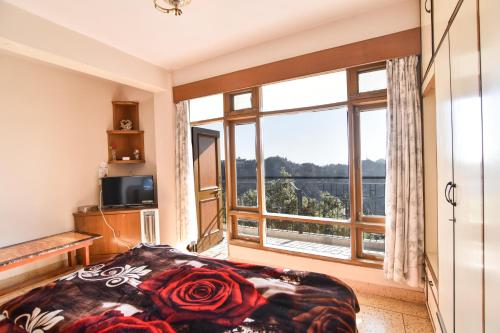 Afbeelding uit fotogalerij van Dhanlaxmi Apartments in Shimla