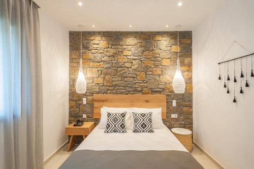 Αngelikon Luxurious Apartmentsにあるベッド