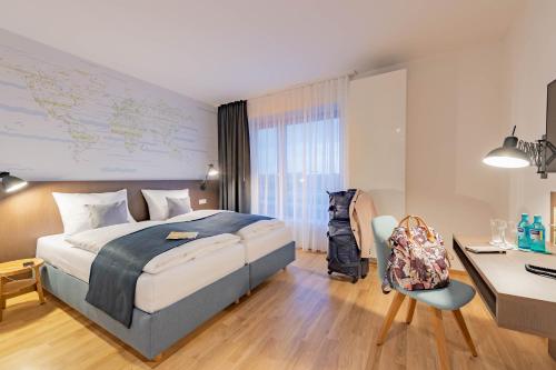 
Ein Bett oder Betten in einem Zimmer der Unterkunft JUFA Hotel Hamburg HafenCity
